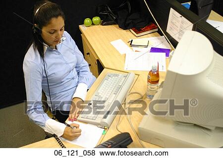 Stock Photo - keyboard inside writing working work desk woman communication sitting office business computer keyboard. Fotosearch