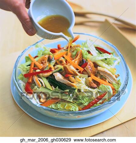 Stock Photo - orange and honey chicken salad. Fotosearch