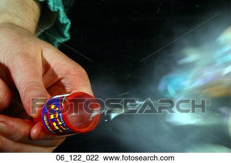 Stock Image - party poppers pop birthday celebration. Fotosearch