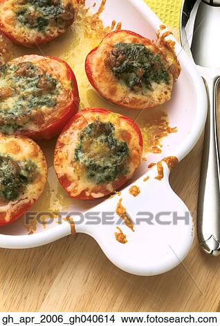 Picture - Pesto and cheese tomotoes.. Fotosearch
