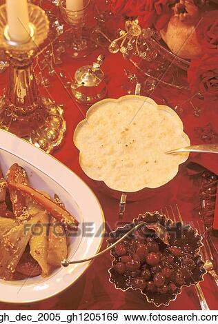 Stock Photo - roast honey-glazed carrots and parsnips. Fotosearch