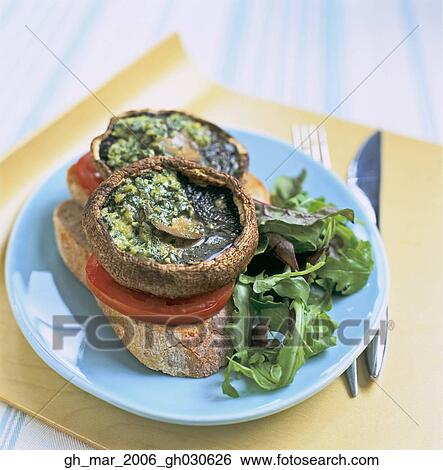Stock Photograph - roast mushrooms with pesto. Fotosearch