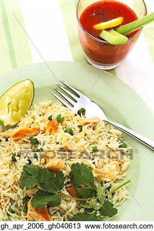 Stock Image - Salmon and coriander kedgeree.. Fotosearch