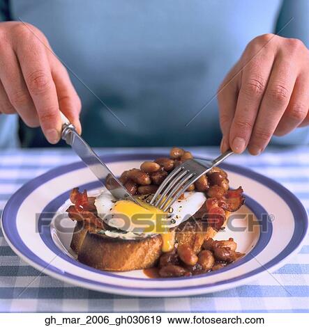 Stock Photo - special baked beans on toast. Fotosearch