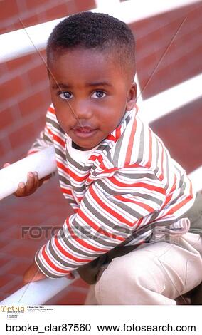 African American boy playing outside View Large Photo Image Stock Image - African American boy playing outside. Fotosearch