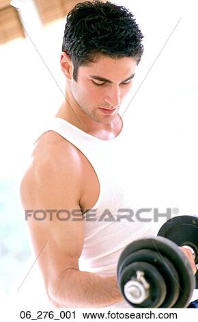 Stock Image -  Body imageMan lifting dumbells . Fotosearch