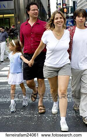 Stock Image - city, walking, family, crossing street. Fotosearch