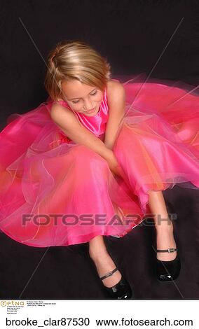 Portrait of a little girl in a dress and shoes View Large Photo Image Stock Image - Portrait of a little girl in a dress and shoes. Fotosearch