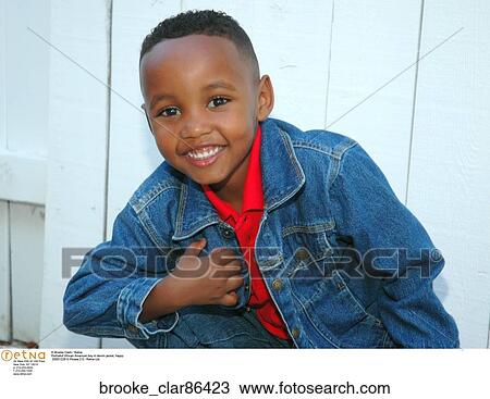 Portraitof African American boy in denim jacket" View Large Photo Image Stock Image - Portraitof African American boy in denim jacket". Fotosearch