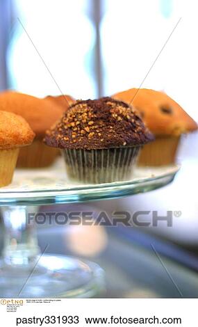 Still life image of muffin / muffins sitting on a platter. View Large Photo Image Stock Image - Still life image of muffin / muffins sitting on a platter.. Fotosearch