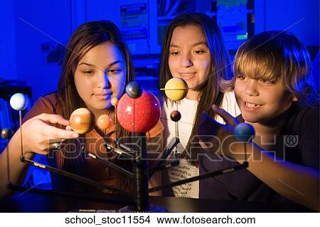 Stock images of science related topics student working on their solar system school project. View Large Photo Image Picture - Stock images of science related topics student working on their solar system school project.. Fotosearch