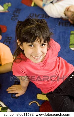 Stock images of science related topics Girl student wearing a pink shirt and sitting in the libray View Large Photo Image Stock Image - Stock images of science related topics Girl student wearing a pink shirt and sitting in the libray. Fotosearch