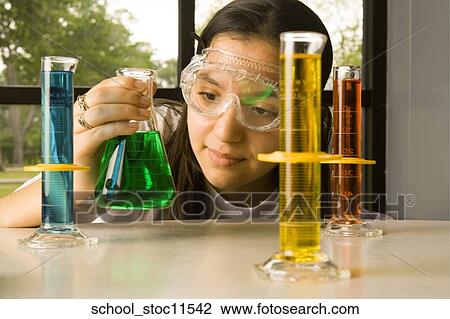 Stock images of science related topics Girl in chemistry class with liquids View Large Photo Image Stock Image - Stock images of science related topics Girl in chemistry class with liquids. Fotosearch