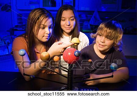 Stock images of science related topics student working on their solar system school project. View Large Photo Image Stock Photography - Stock images of science related topics student working on their solar system school project.. Fotosearch