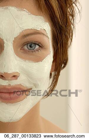 Headshot front view detail young woman short hair blue eyes in a face mask looking at camera smiling View Large Photo Image Stock Image - Headshot front view detail young woman short hair blue eyes in a face mask looking at camera smiling. Fotosearch