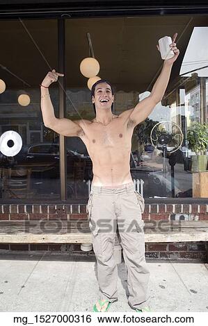 Stock Photograph - man, outside, holding cup. Fotosearch