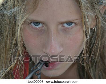 blue eyes, girl, bad, eyeglasses, lip, irritated View Large Photo Image Stock Image - blue eyes, girl, bad, eyeglasses, lip, irritated. Fotosearch