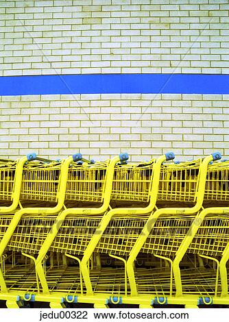 Stock Image - buying, CLOSE UP, yellow-blue, objects, purchase, shoot from front, Selling. Fotosearch