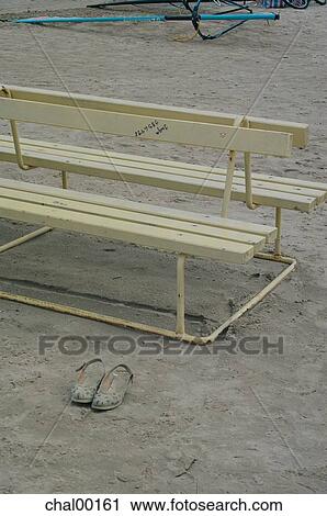 Stock Image - call, telephone number, name, bench, beach, shoes, woman. Fotosearch