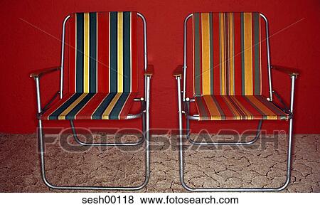 chairs, hinged, folding chairs, furniture, sun chairs, striped, abandoned View Large Photo Image Stock Photo - chairs, hinged, folding chairs, furniture, sun chairs, striped, abandoned. Fotosearch
