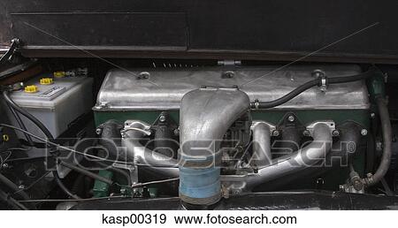 Stock Photo - classic car, feed line, cyl, engine, engine mount, machine, car. Fotosearch