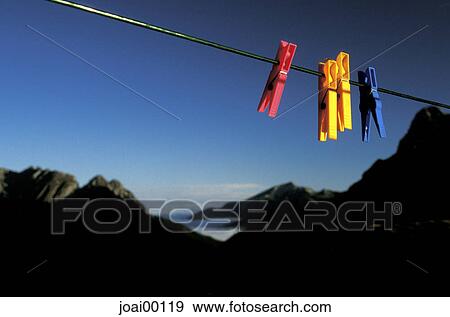 clothes peg, clothesline, dusk, Mountain, objects, plastic, Twilight View Large Photo Image Stock Photo - clothes peg, clothesline, dusk, Mountain, objects, plastic, Twilight. Fotosearch
