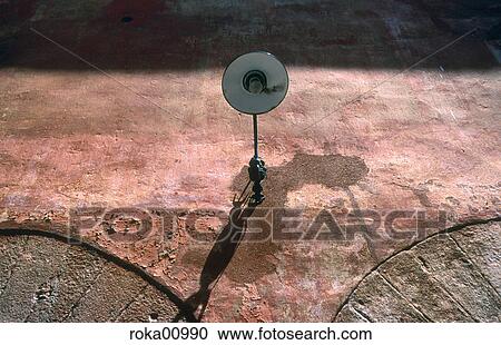 Stock Image - coat of paint, house wall, lamp, illumination, lighting, decay, expiration. Fotosearch