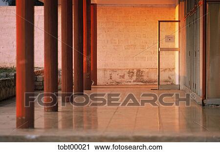 Stock Image - colorless, Croatia, gang, French door, hotel, bog, evening light. Fotosearch