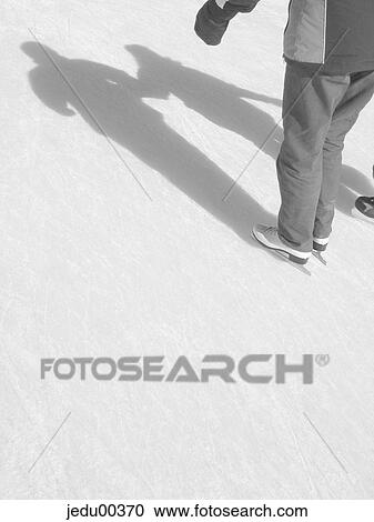Stock Image - couple, Day, ice skating rink, free time, ice, ice rink, leg. Fotosearch