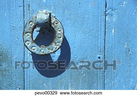 Stock Photo - Day, peter, objects, circlet, turquoise, door, blue. Fotosearch