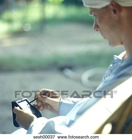 diary, technology, hand-held computer, finger, detail View Large Photo Image Stock Photo - diary, technology, hand-held computer, finger, detail. Fotosearch