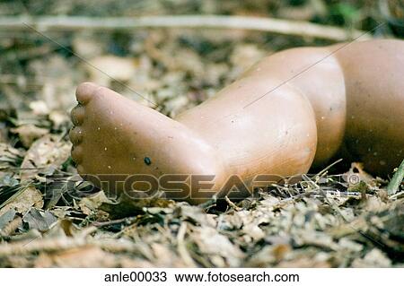 Stock Image - doll, puppet, leg, child, childhood, toy, plaything. Fotosearch