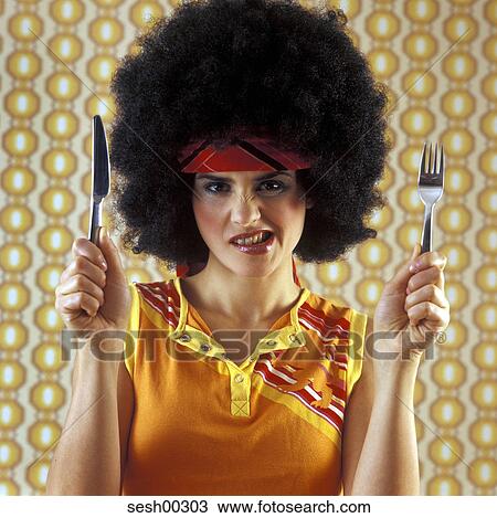 Stock Image - dress style, studio, woman, human, modern, fashion-conscious. Fotosearch