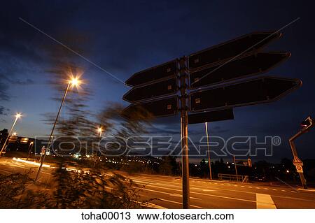 evening, night, fingerpost, marker, wide angle, blue, yellow View Large Photo Image Stock Image - evening, night, fingerpost, marker, wide angle, blue, yellow. Fotosearch