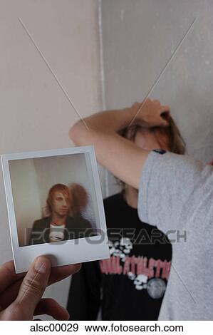 Stock Photo - fashion, hand, proof, sweater, scull, teenager. Fotosearch