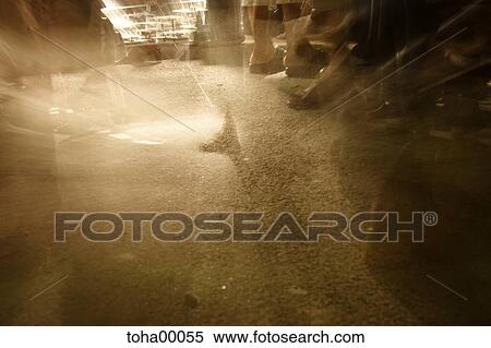 Stock Photography - foot, shoe, crowd, legs, bottom, ground, soil. Fotosearch