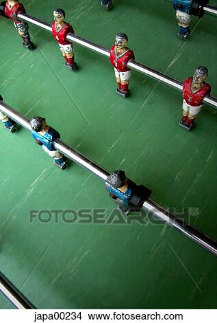 football, football ground, football pitch, football player, free time, indoors, football table View Large Photo Image Picture - football, football ground, football pitch, football player, free time, indoors, football table. Fotosearch