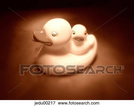 Stock Photo - full view, rubber duck, indoors, objects, shoot from front, side-face. Fotosearch