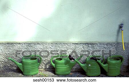 garden utensils, watering cans, wall, grey, faucet, hose, gardening tool View Large Photo Image Stock Image - garden utensils, watering cans, wall, grey, faucet, hose, gardening tool. Fotosearch