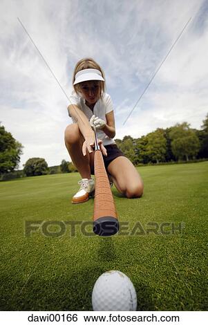 gulf, golf club, golfball, young woman, putter, sport, goal View Large Photo Image Stock Photograph - gulf, golf club, golfball, young woman, putter, sport, goal. Fotosearch