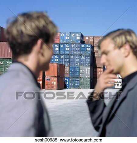 Stock Photo - humans, businessmen, business, industry, trade, portrait, container. Fotosearch