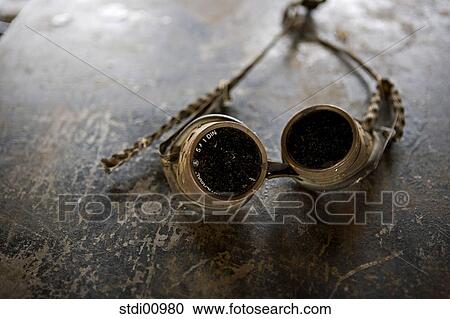 Stock Image - industrial safety, protective clothing, welding goggles, welding, eye guard, technology, engineering. Fotosearch