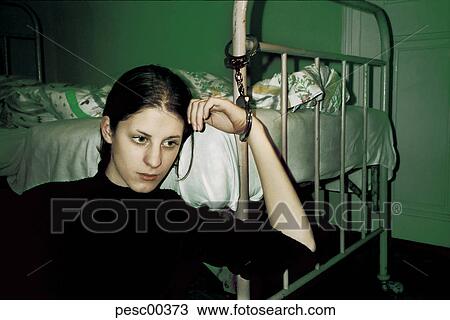 Stock Image - kidnaped, kidnapped, abducted, abducts, hijacked, hijacks, prisoner. Fotosearch