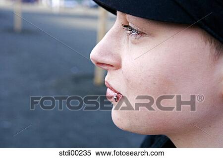 lip piercing, woman, eyes, cap, view, black, lips View Large Photo Image Stock Photography - lip piercing, woman, eyes, cap, view, black, lips. Fotosearch