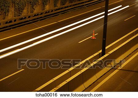 motorway, road marking, cordon, barrier, evening, night, time exposure View Large Photo Image Stock Photograph - motorway, road marking, cordon, barrier, evening, night, time exposure. Fotosearch