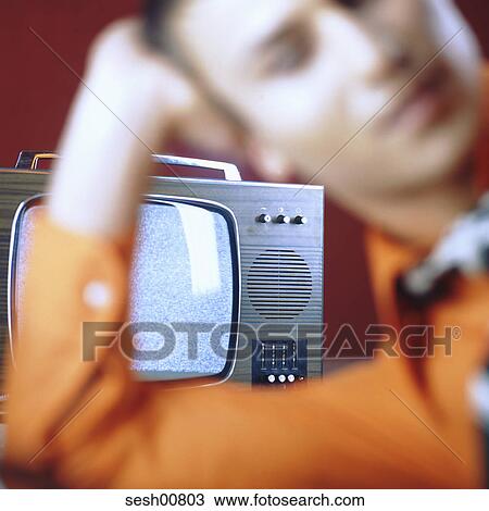 orange, human, Young adult, television, TV View Large Photo Image Stock Image - orange, human, Young adult, television, TV. Fotosearch
