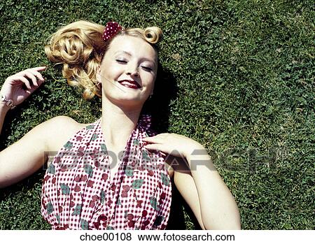 outdoor shot, arms, fashion, closed eyes, grass, ringlet, ribbon View Large Photo Image Stock Photo - outdoor shot, arms, fashion, closed eyes, grass, ringlet, ribbon. Fotosearch