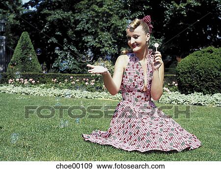 outdoor shot, fashion, grass, ringlet, ribbon, lass, pout View Large Photo Image Stock Photo - outdoor shot, fashion, grass, ringlet, ribbon, lass, pout. Fotosearch