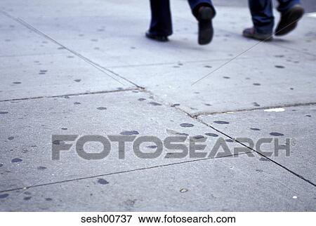 Stock Photo - plates, concretes, black, grey, lower part of the body, legs, walk. Fotosearch