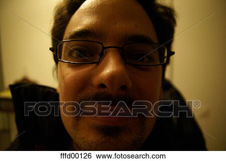 portrait, face, dark, eyeglasses, angular, unshaved View Large Photo Image Stock Photograph - portrait, face, dark, eyeglasses, angular, unshaved. Fotosearch
